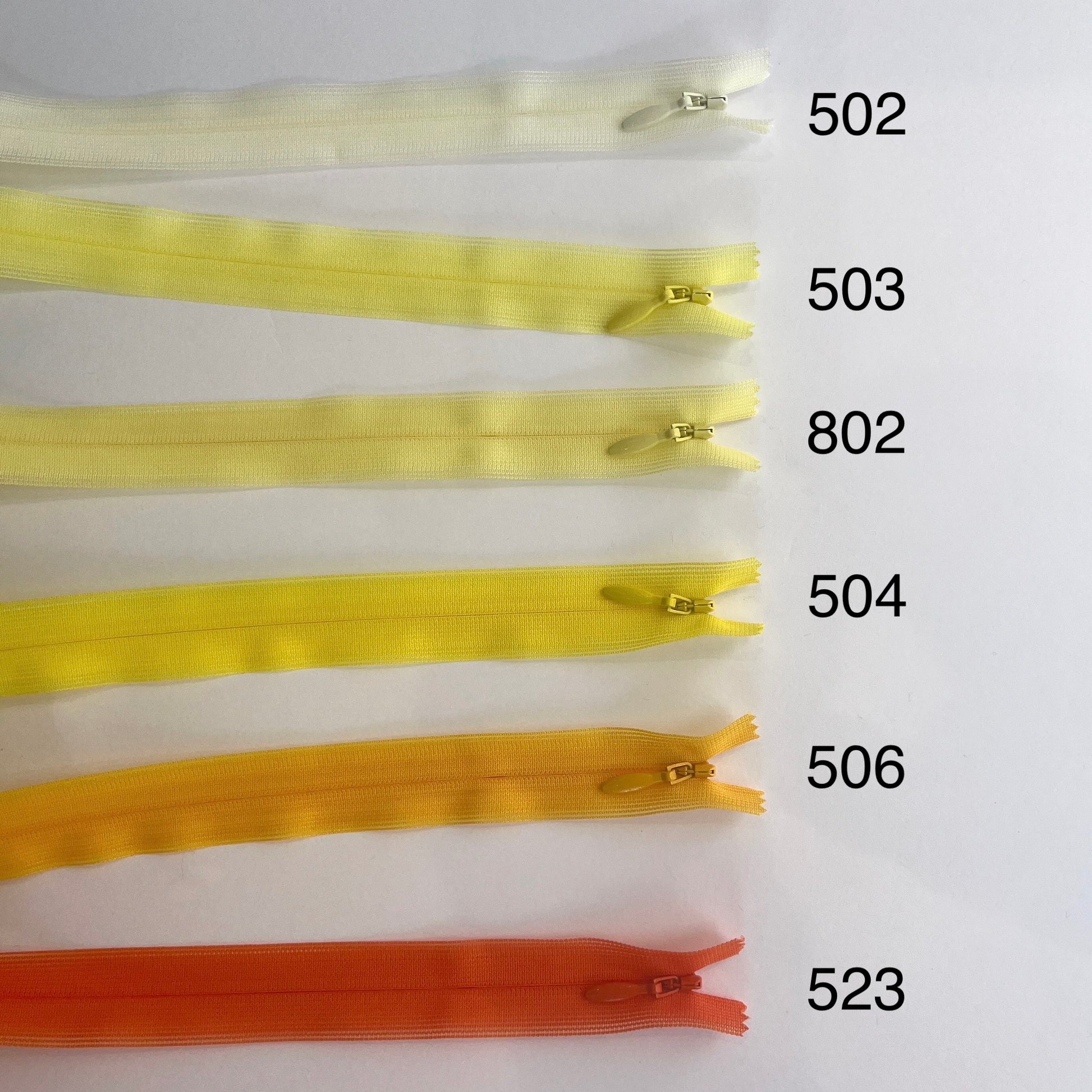 Ykk Lightweight Invisible zip in yellow/orange/red/pinks - 66cm (26")
