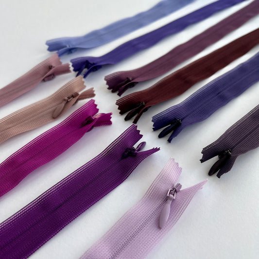 YKK Lightweight Invisible zip in purple shades - 66cm (26") length, Lightweight invisible, concealed zip with closed-end for dressmaking.