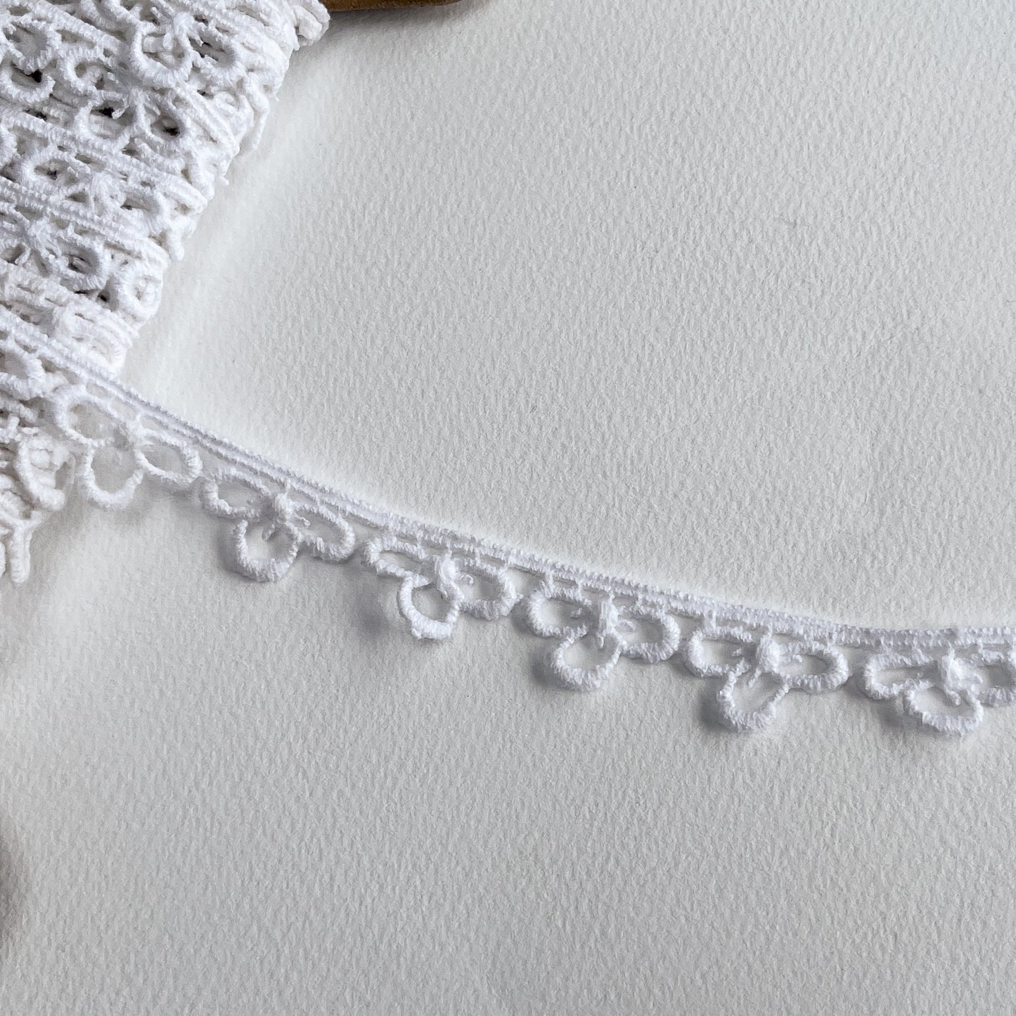 Vintage Trefoil Cotton guipure lace trim  with a matt finish, we believe to be from the 1980s